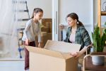Unpacking box with household stuff